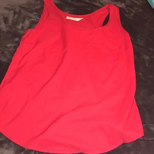 Red women’s tank top with front pocket